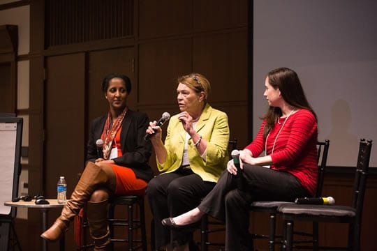 Photo of three women on event panel
