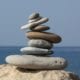 Photo of balancing stones for balance in business of lifelong learning concept